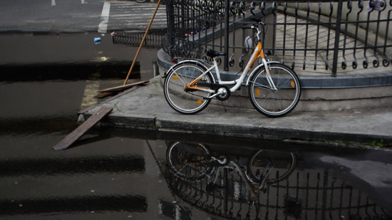 Bike sitting on sidewalk