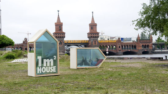 Two one-square-meter houses in a field