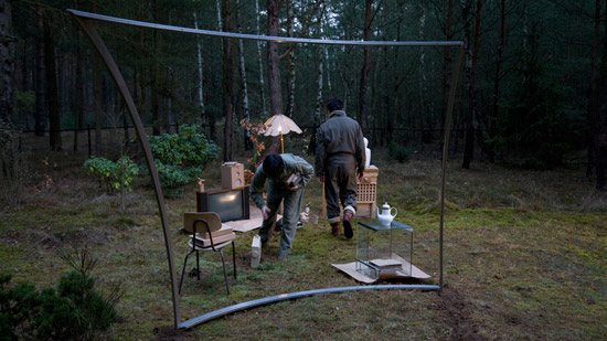 A livingroom set up in the woods