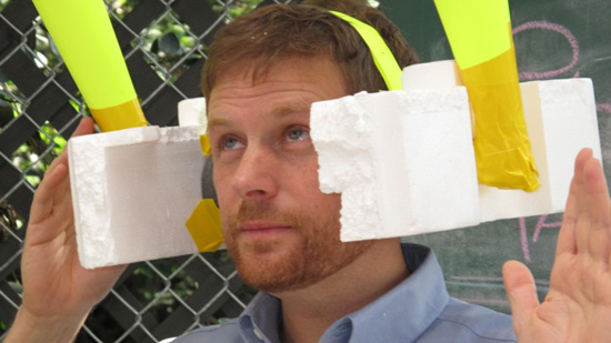 Workshop participant wearing styrofoam headgear