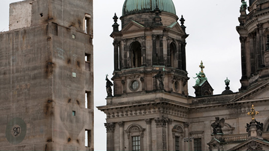 Two facades: a church and a derelict building