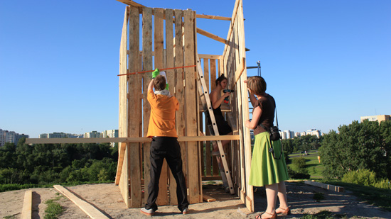 Workshop participants building a structure