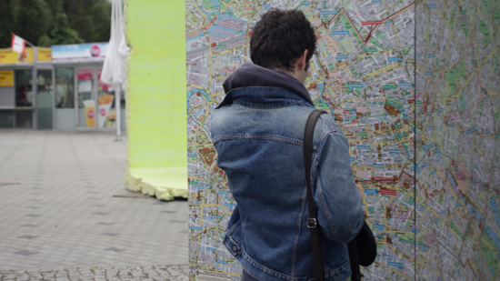 A person looking at a map of Berlin